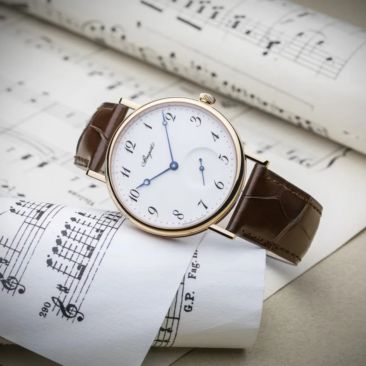 Breguet Classique 7147BR in 18K rose gold with Grand Feu enamel dial, Breguet numerals, and blued pomme hands