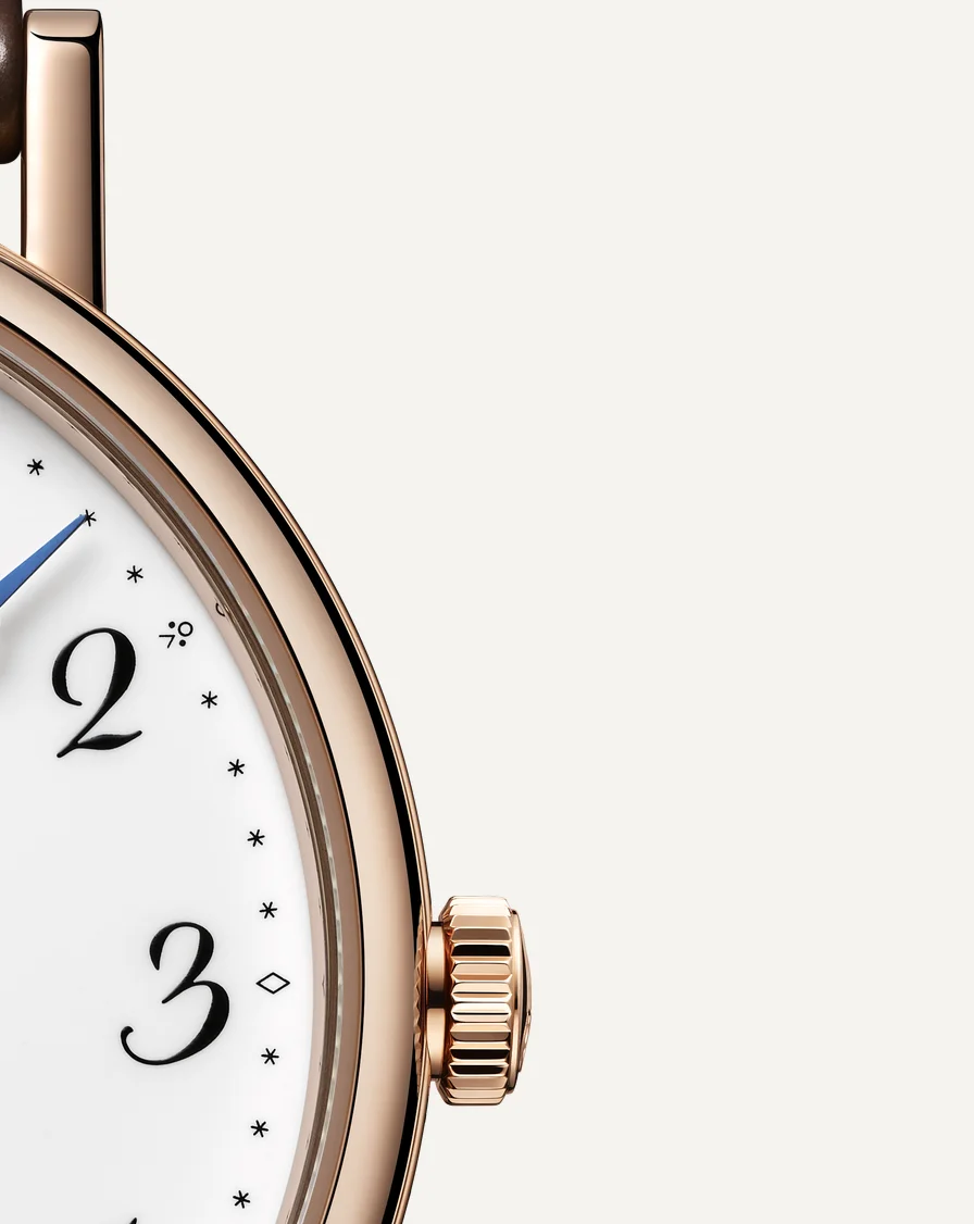 Profile view showing the 6.5mm case thickness and fluted coin-edge case band