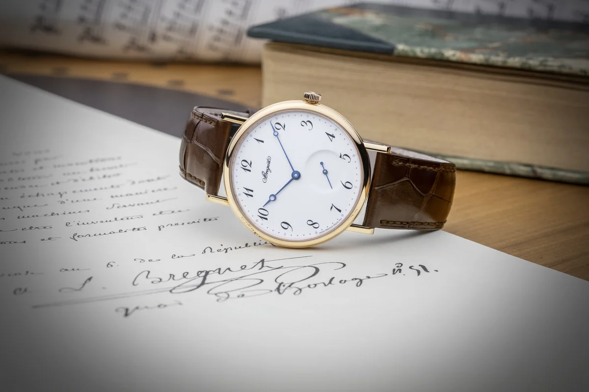 Caliber 502.3 SD dial side showing perlage finishing, jewels, and the balance wheel assembly