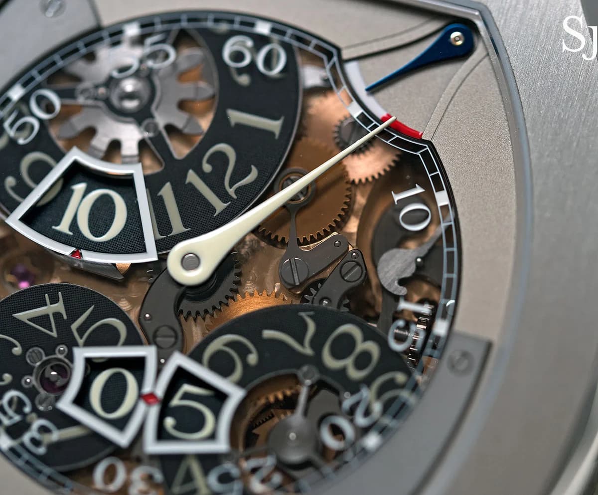 Rose gold Vagabondage III front view showing the dual jumping seconds windows at 6 o'clock and hour window at 10 o'clock