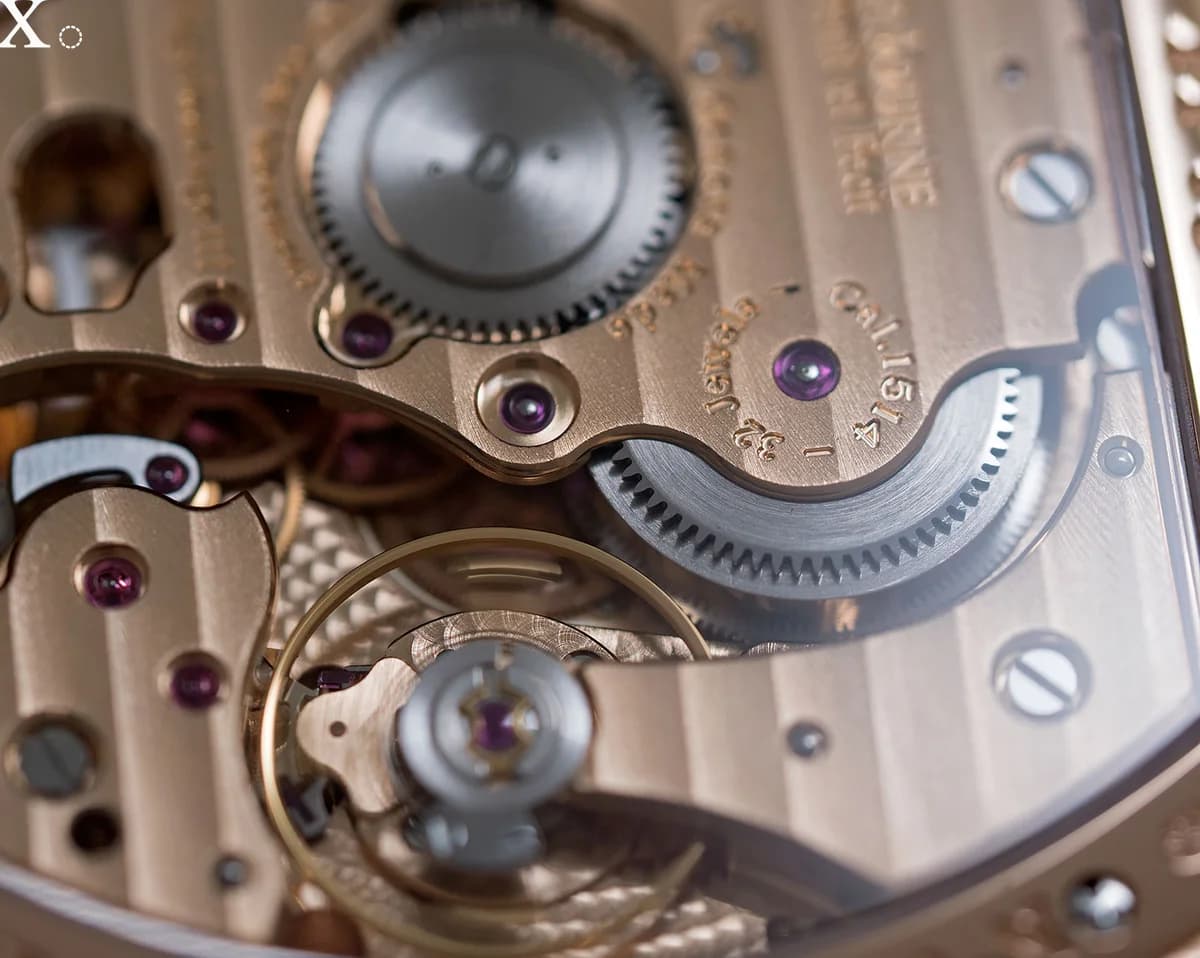 Caliber 1514 through the platinum caseback, 18K rose gold movement with Geneva stripes, signed Invenit et Fecit
