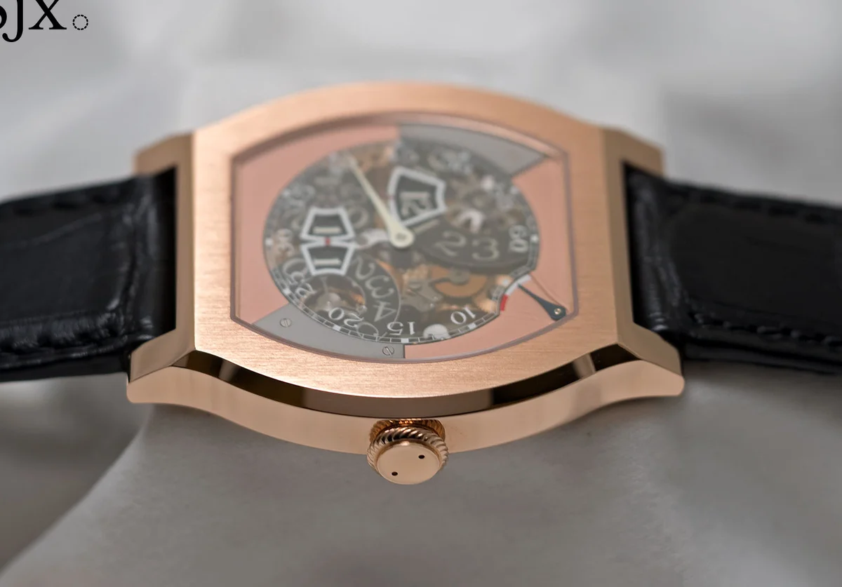 Rose gold caseback detail showing Cal. 1514 engraving, 32 Jewels, and the S-shaped bridge architecture