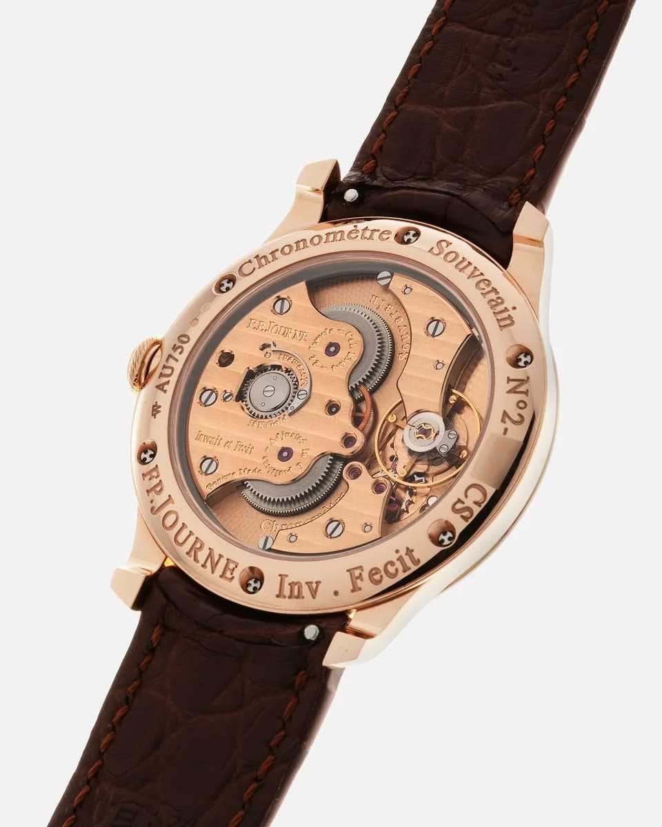 Tight crop on the Chronometre Souverain dial in 18K 6N rose gold. The whitened guilloche silver dial, gold applique numerals, and blued steel hands are visible.