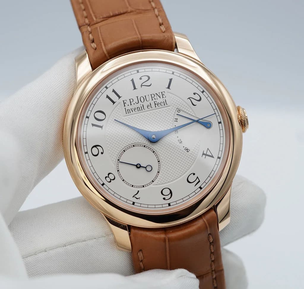 Dial macro showing the barleycorn guilloche pattern on the center dial and the sub-seconds register at 7:30.