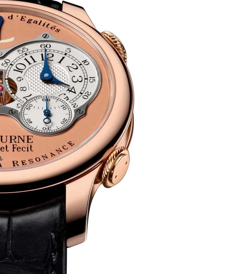 Upper bezel and dial showing the rose gold case, the Remontoirs d'Egalites engraving, and the power reserve indicator with its blued steel hand.