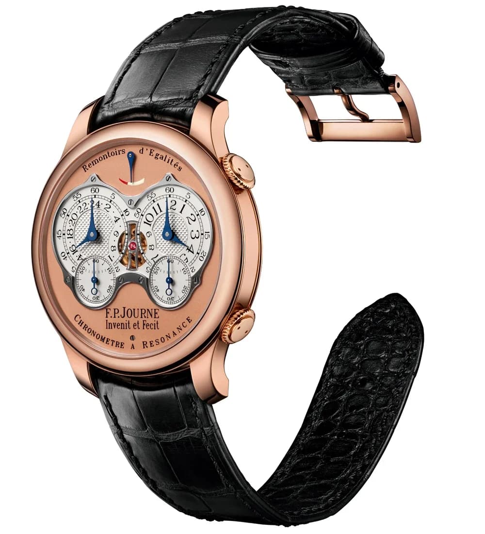 Crown detail showing both rose gold crowns at 2 and 4 o'clock. The upper crown handles winding and time setting, the lower crown resets both small seconds to zero.