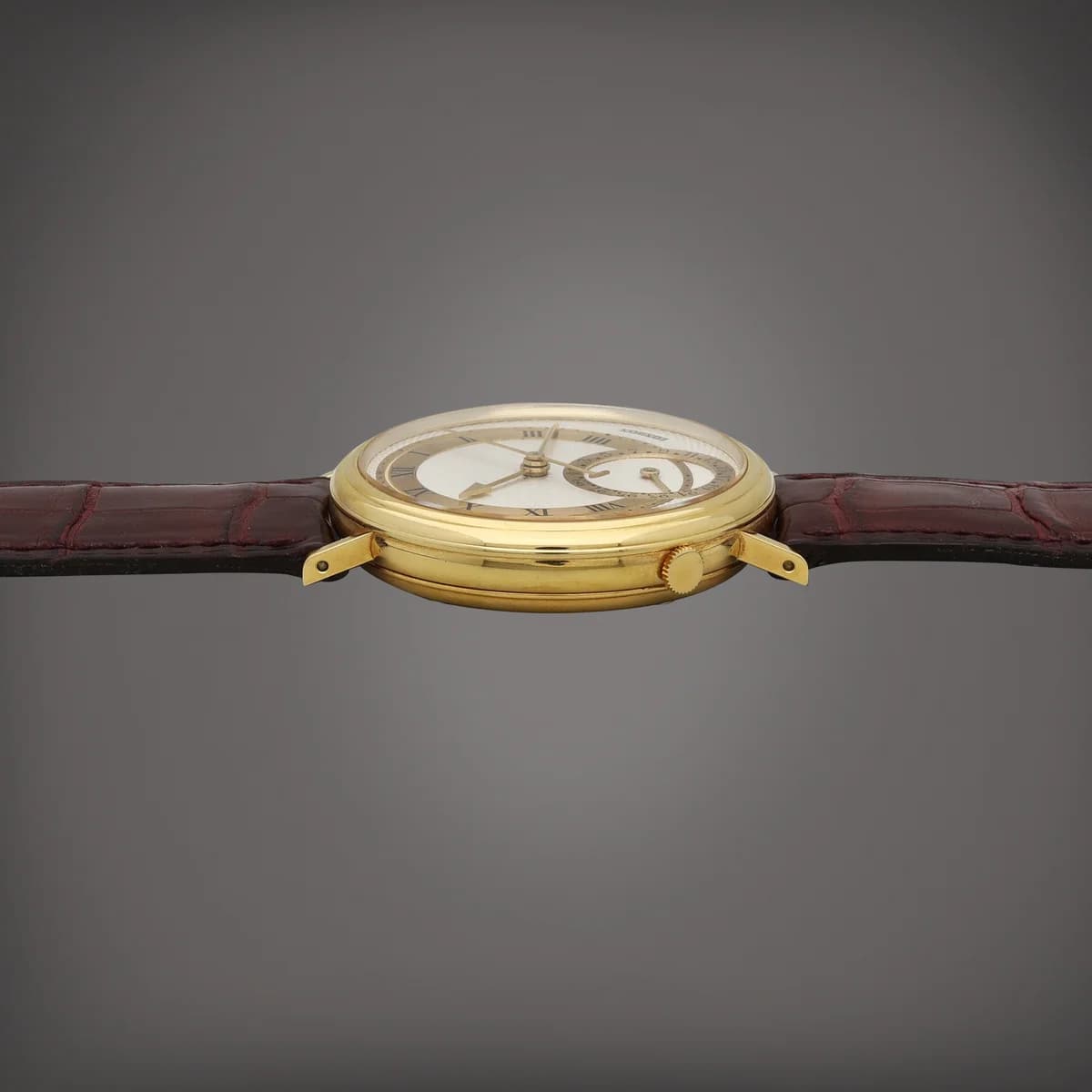 Full watch on brown crocodile strap showing the dial proportions and classical silhouette.