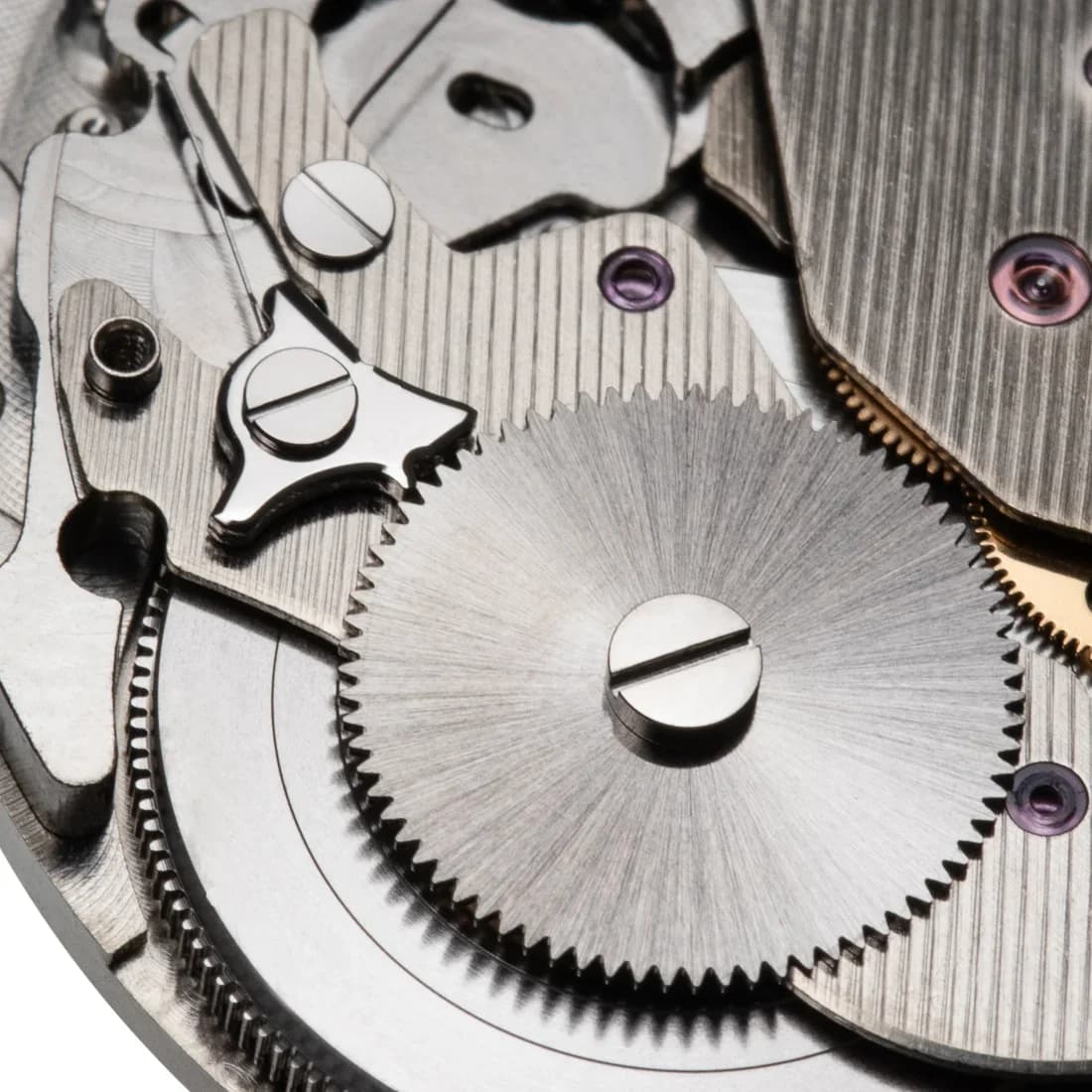 Caliber 9R65 dial side showing the Snowflake texture, power reserve indicator, and blue seconds hand