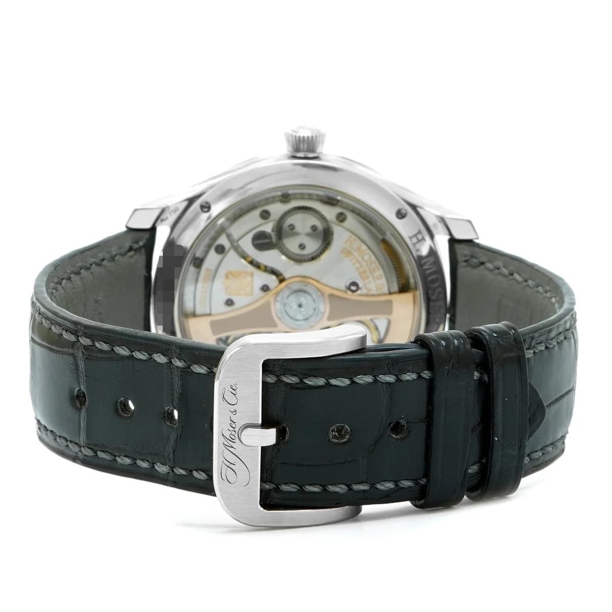 The engraved oscillating weight and Moser stripes finishing on the HMC 200