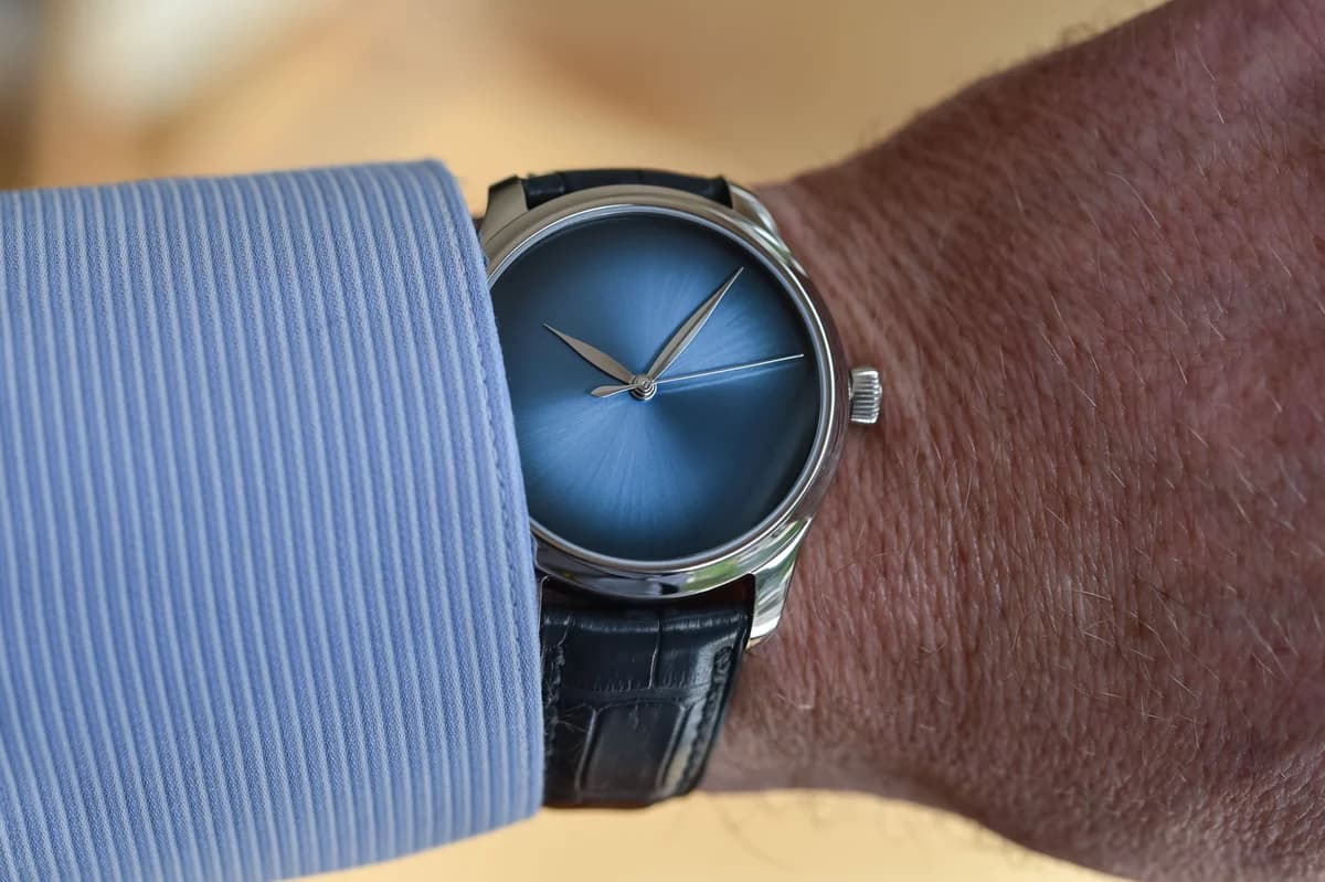 Low-angle view showing the curved lugs and strap attachment at the case
