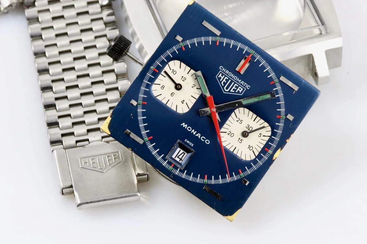 Monaco on the original stainless steel bracelet with the Heuer shield clasp. Most surviving examples are on leather rally straps.