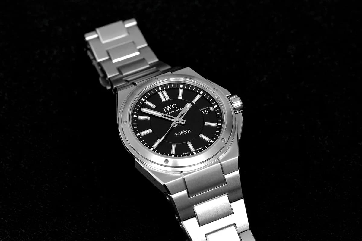 IWC Ingenieur IW323902 dial detail showing the two-tiered black dial with applied indices and five bezel recesses