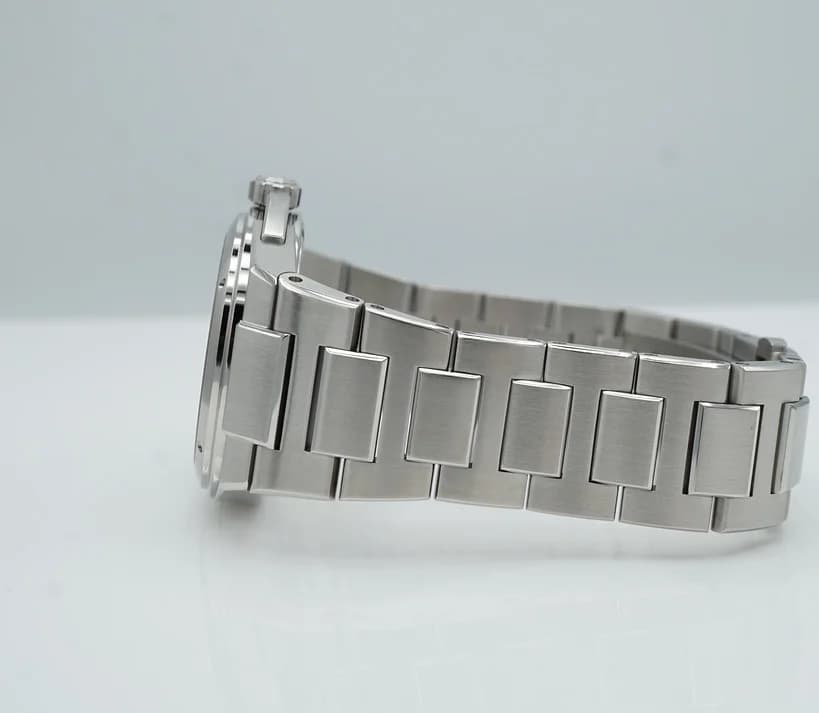 Solid caseback engraved with International Watch Co. and Ingenieur, hiding the soft iron Faraday cage beneath