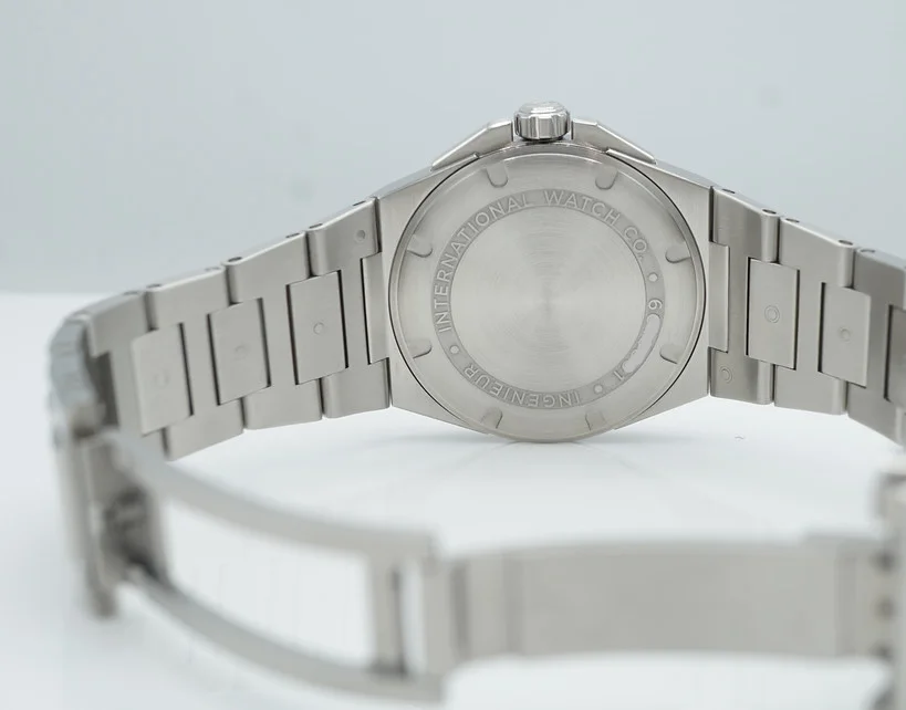 IWC-branded deployant clasp with push-button release