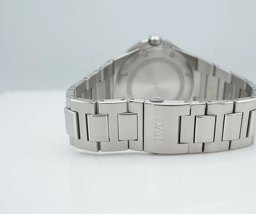 Front view on the watch cushion showing the clean dial proportions at 40mm