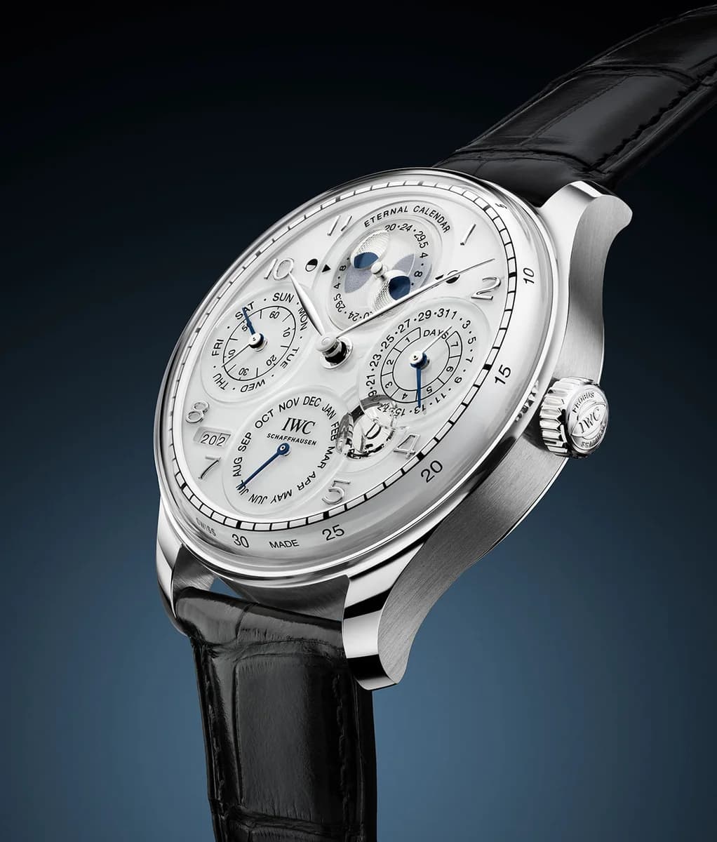 Glass dial construction detail showing the domed sapphire crystal being separated from the dial and movement assembly