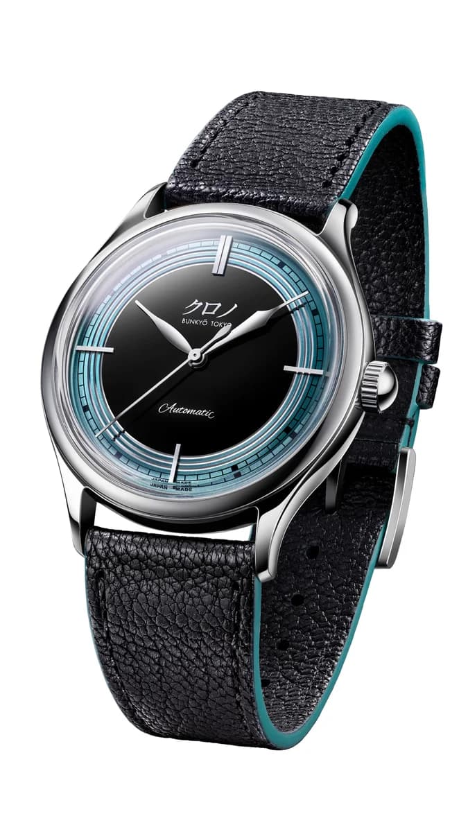 Full view with the green-embellished leather strap