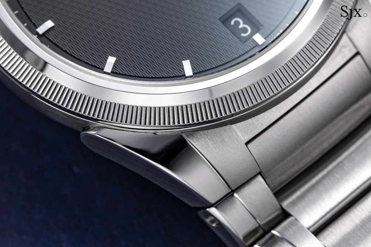 Side profile revealing the 7.8mm case thickness and screw-in crown with PF logo