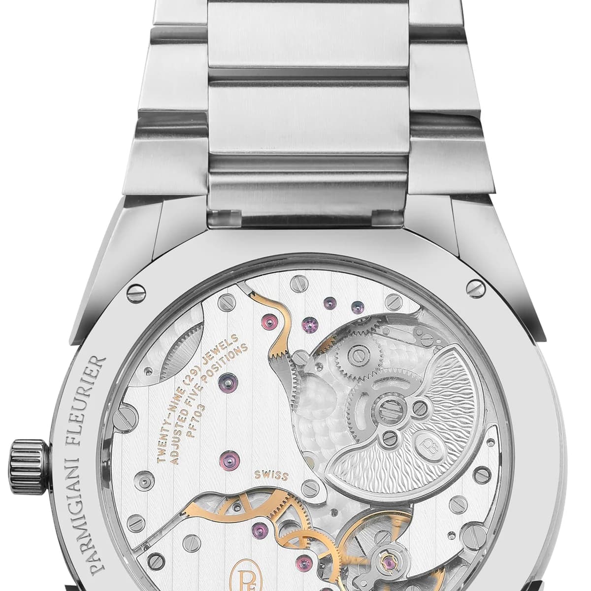 Skeletonized delta-shaped hands in 18K rhodium-plated gold against the textured grain d'orge surface
