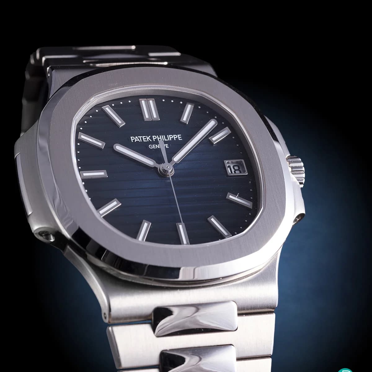Patek Philippe Nautilus 5811/1G-001: white gold case, blue horizontally embossed dial, integrated bracelet