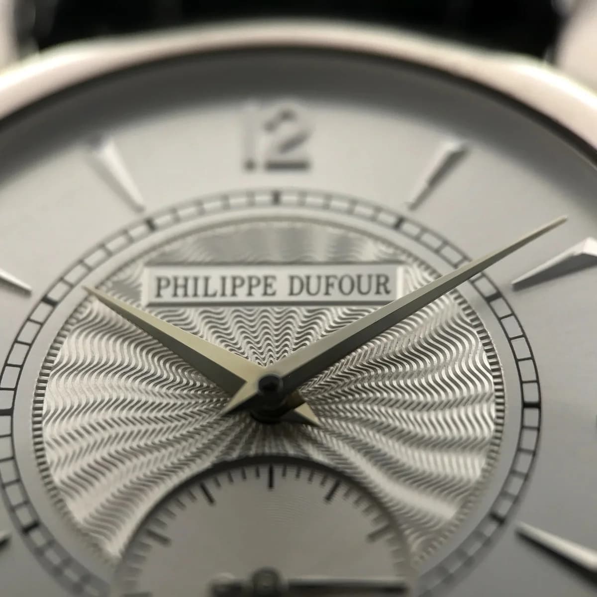 Click mechanism and crown detail. Note the mirror-polished steel surfaces and hand-cut bevels.