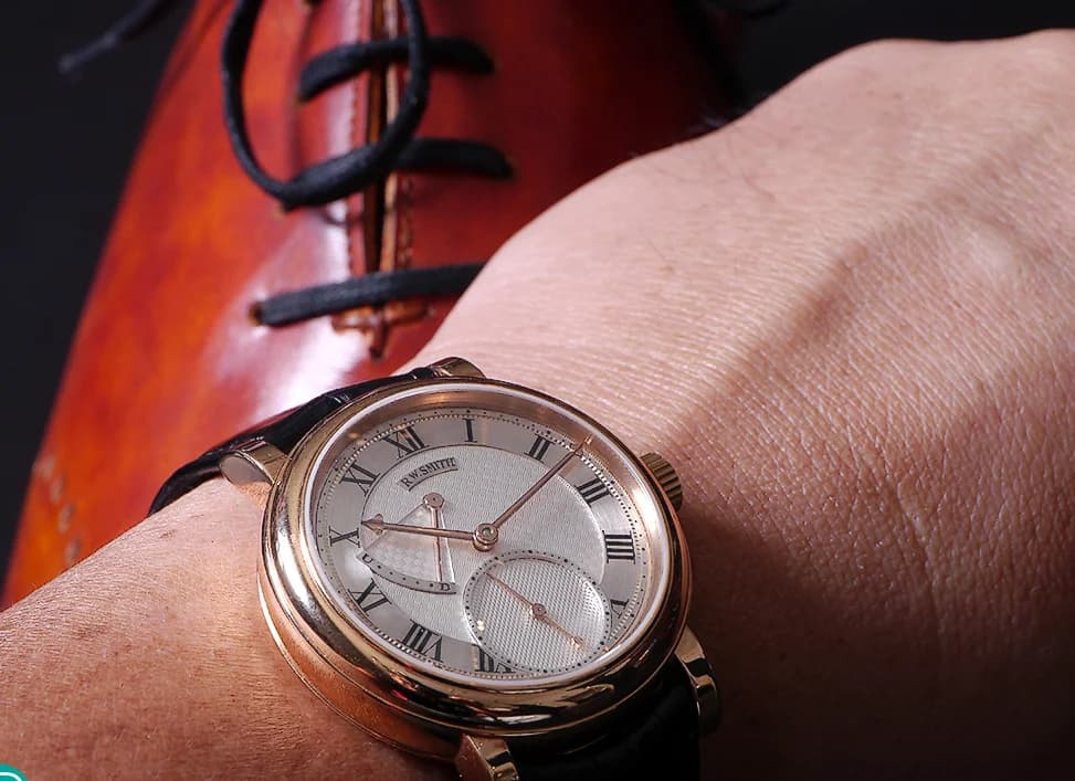 Series 2 in 18K rose gold with engine-turned silver dial. The warm rose gold case and matching hands create a monochromatic warmth distinct from the steel and white gold variants.