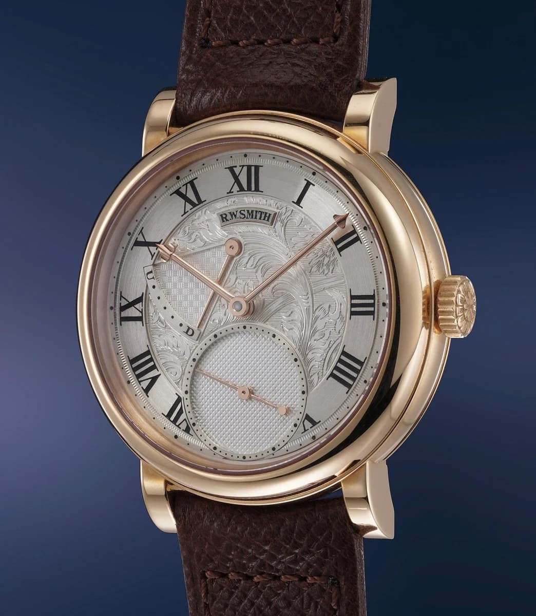 The Series 2 Open Dial in platinum, showing the exposed movement from the dial side. The frosted gilt plates and co-axial escapement are visible through the semi-skeletonized dial.