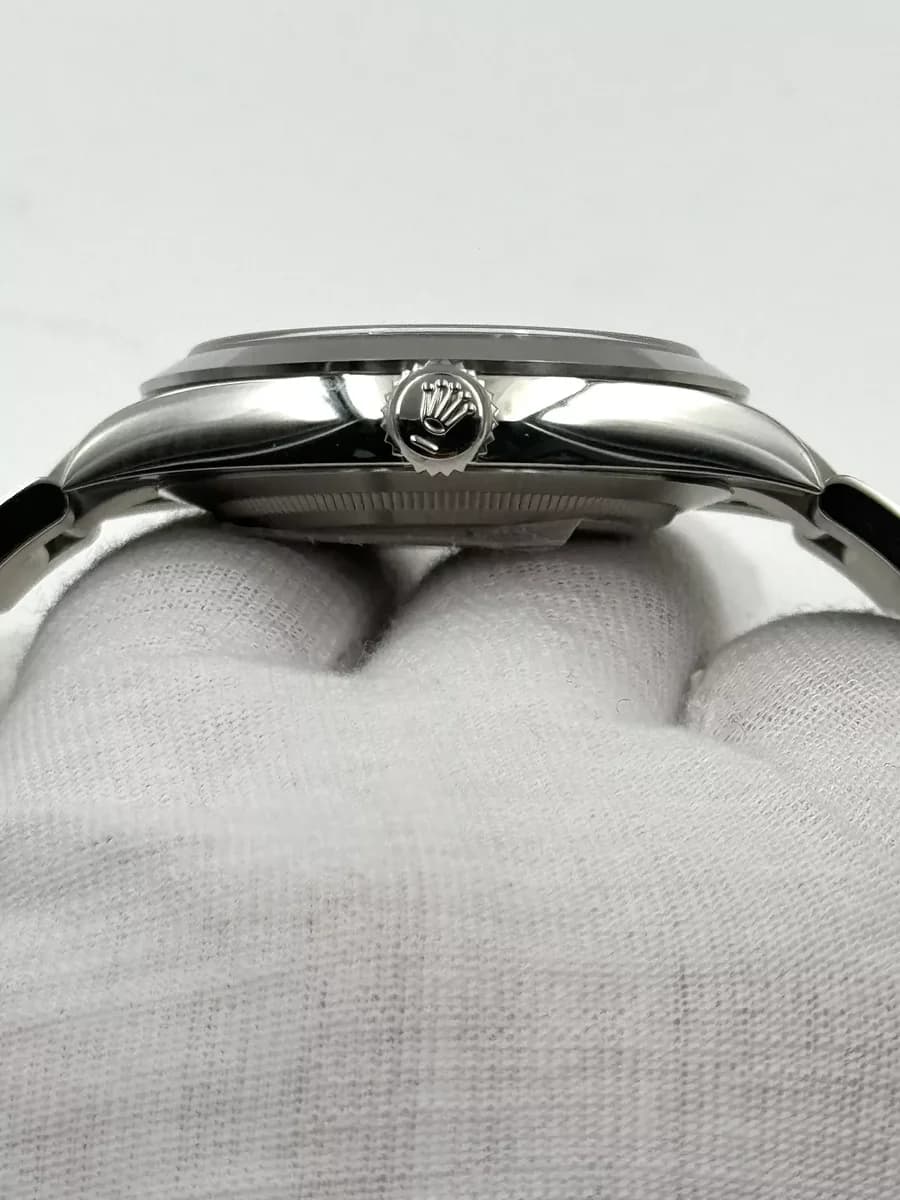 Dial macro showing the applied indices, Chromalight fill, and the depth of the gloss black lacquer finish.