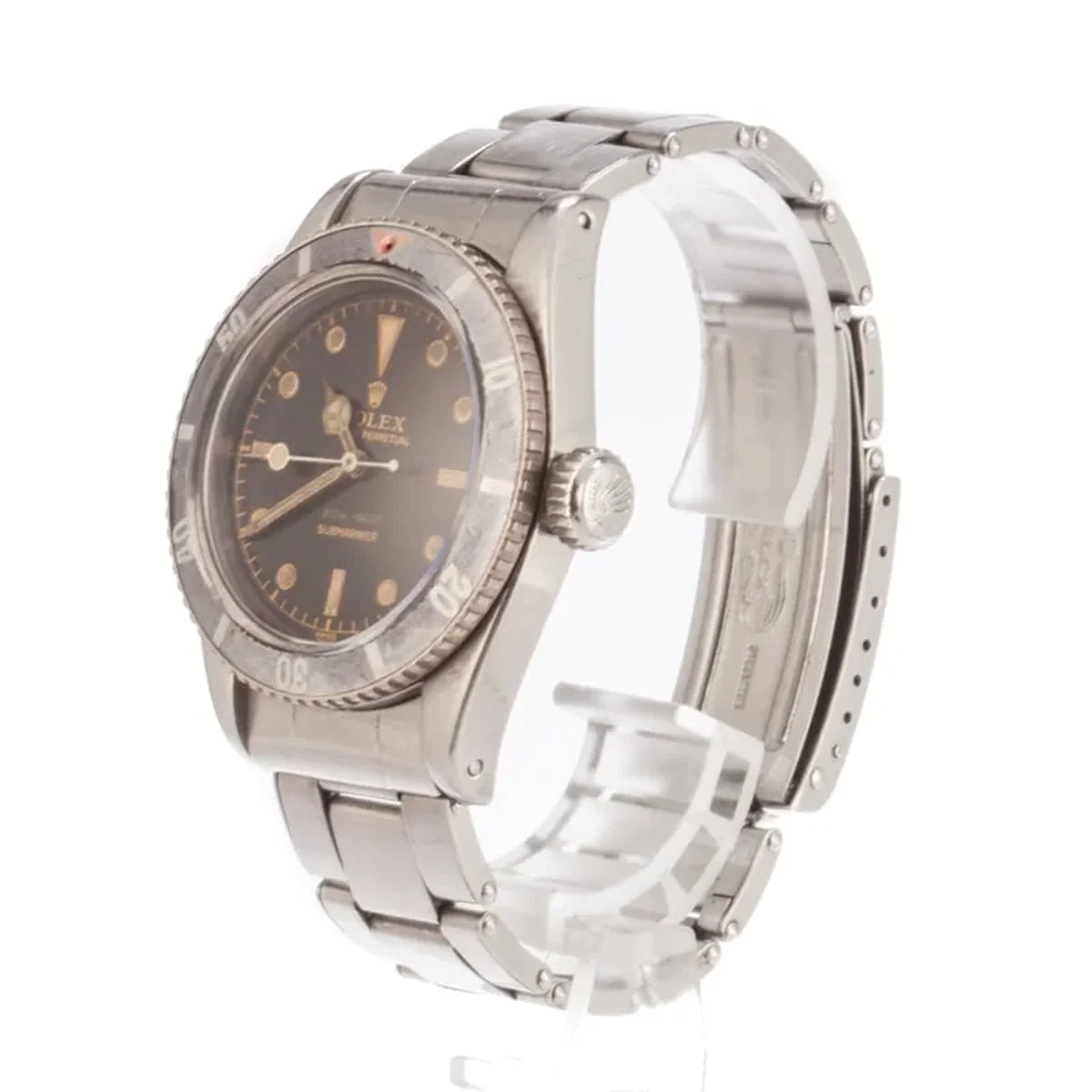 The rare 4-liner chronometer dial: gilt text reading "Officially Certified Chronometer" below the Submariner designation