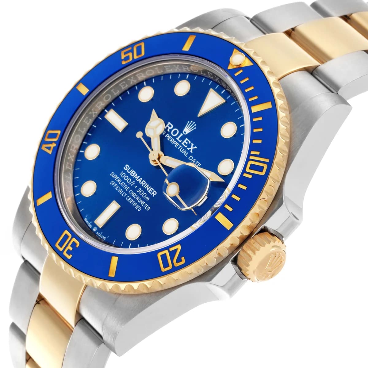 18K yellow gold Triplock crown with Rolex logo between gold crown guards