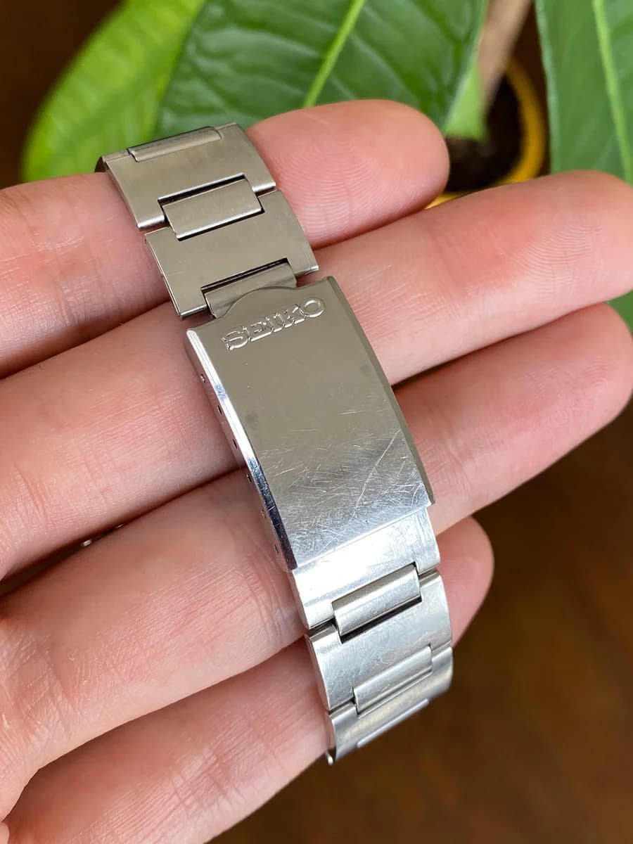 The original three-link Oyster-style stainless steel bracelet.
