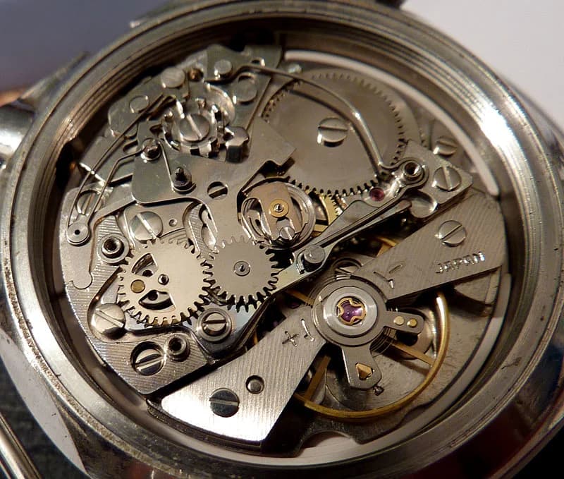 Three-quarter view showing the cushion case profile and integrated bracelet.