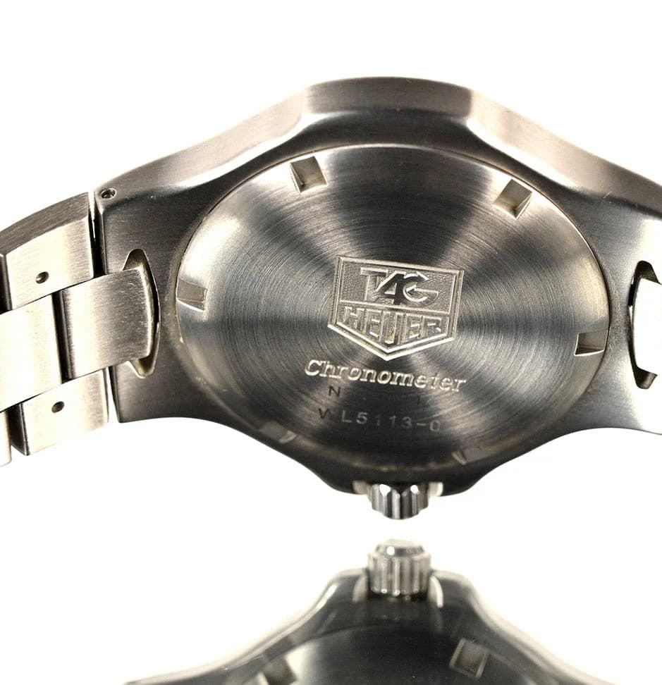 Deployment clasp with TAG Heuer logo, sits flat against the wrist
