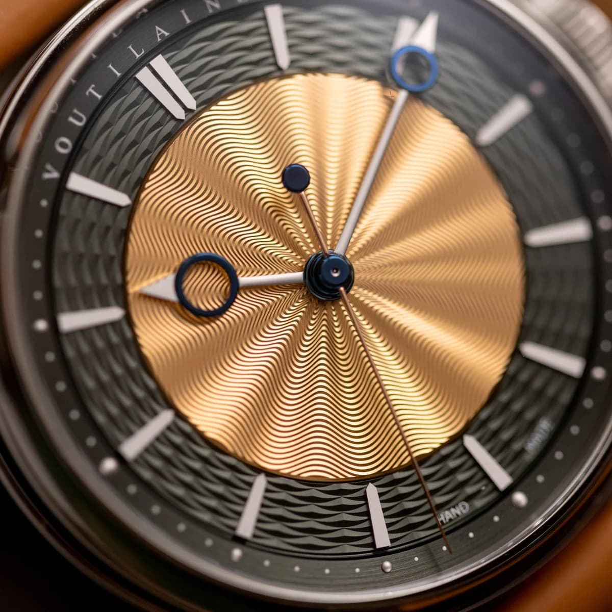 Side profile showing the 13.3mm case thickness and in-house crown