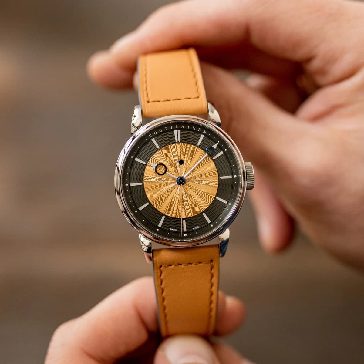 Caliber 28 movement through the exhibition caseback, showing German silver bridges and gold wheels